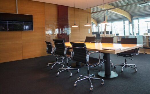 conference room with tv on wood paneled wall gettyimages 530682165 1200w 628h