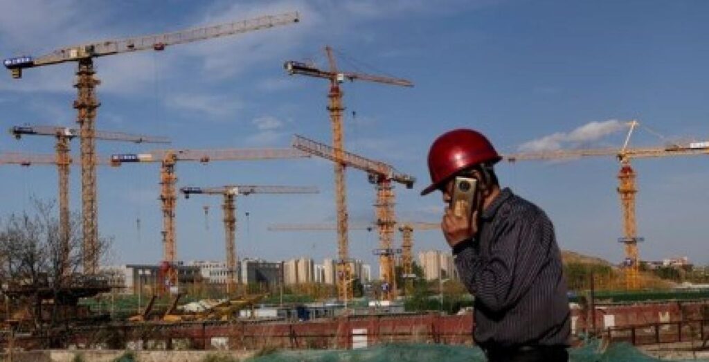 A worker is seen at a China construction site Rs